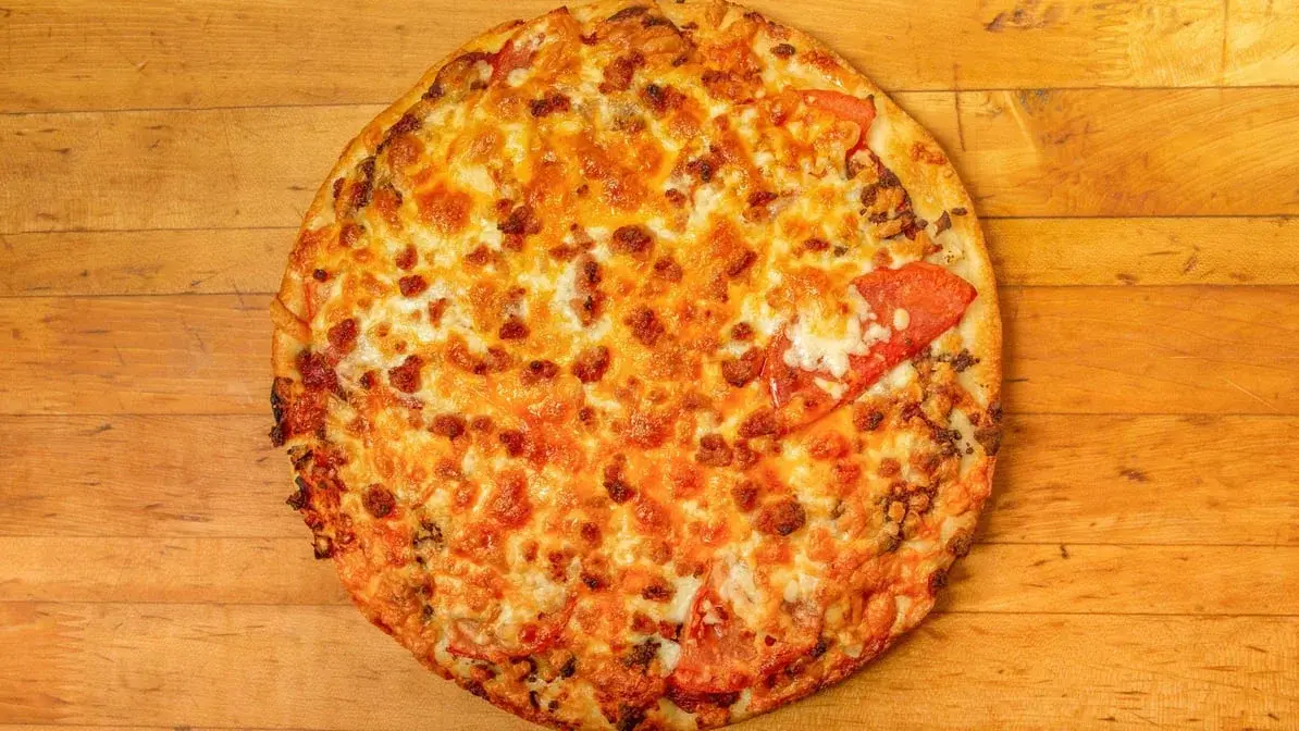 Donair pizza with signature donair meat at Jon's Pizza Calgary